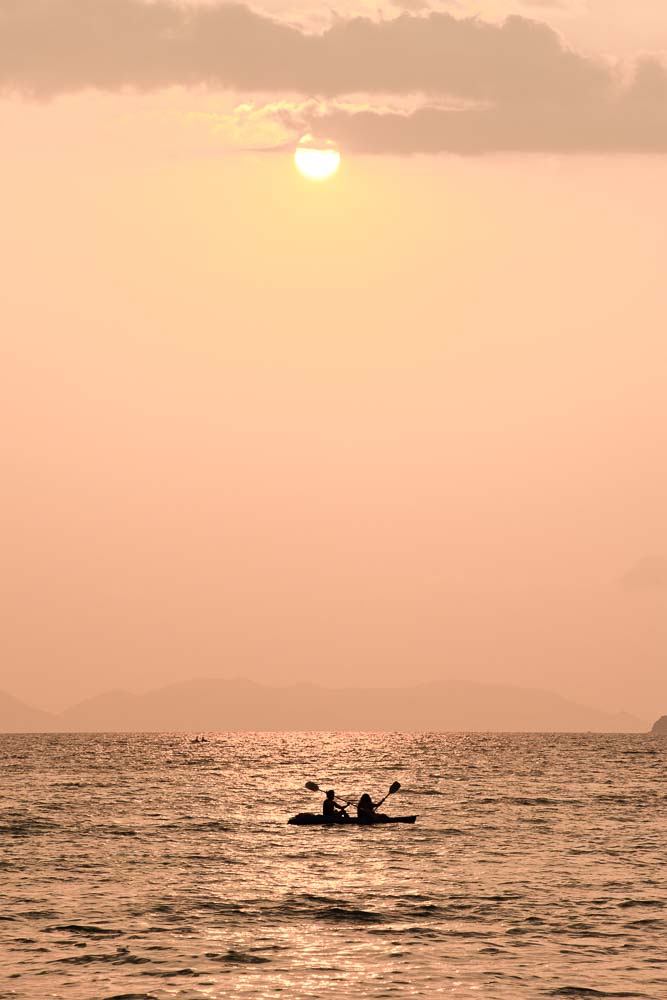 Kayaking under the beautiful sunset of Koh Samui