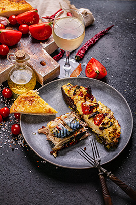 mackerel fish over toast with white wine at Ampersand resort bar & restaurant